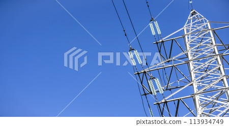 High voltage tower against the sky. Power transmission tower with wires 113934749