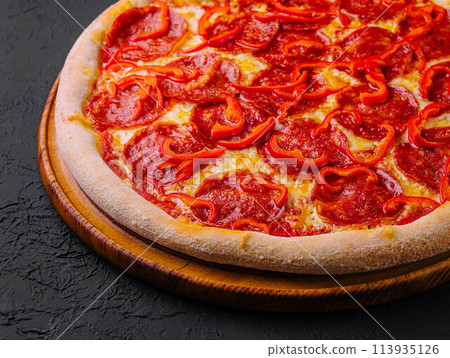 tasty pepperoni pizza with red bell peper tasty pepperoni pizza with red bell peper 113935126