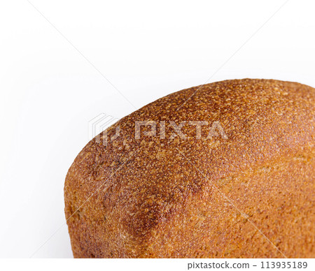 Black bread in the form of a brick 113935189