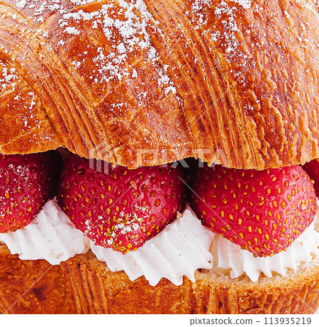 strawberry and fresh cream croissant closeup strawberry and fresh cream croissant closeup 113935219