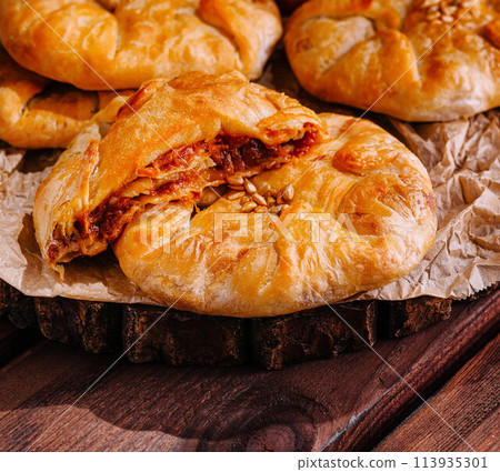 Placinta, traditional Moldovan pastries with peaches Placinta, traditional Moldovan pastries with peaches 113935301