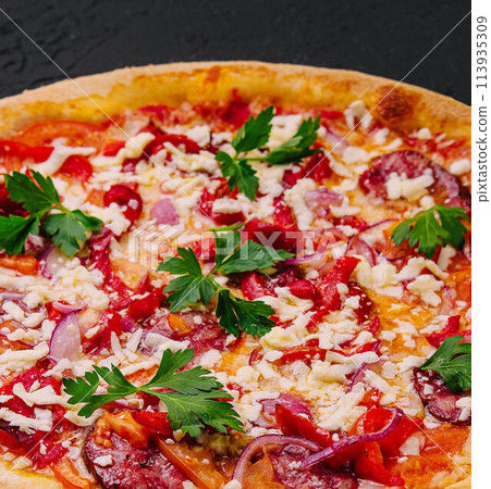 Italian pizza on black stone Italian pizza on black stone 113935309