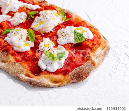 Pizza Margherita on white stone Pizza Margherita on white stone 113935602