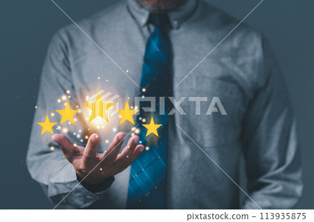 hand of customer or businessman holding stars to complete five stars for satisfaction service mind. he smiles and is happy before giving five star rating. Service rating, satisfaction concept. 113935875