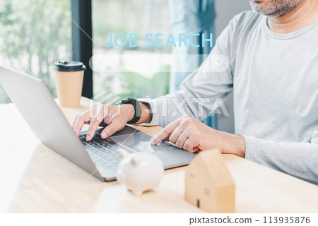 Searching Browsing Internet Data Information with search job in bar. Search Engine Optimization SEO Networking Concept. hand of businessman working with computer laptop on a wooden desk in an office 113935876