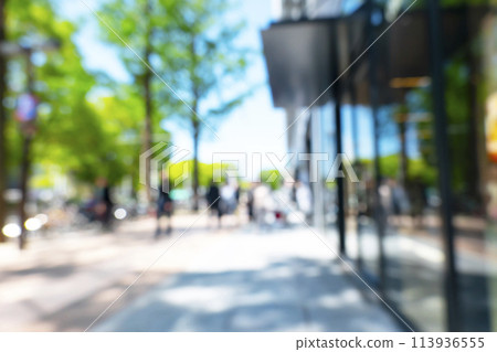 Blurred background of business district in early summer Blurred background of business district in early summer 113936555