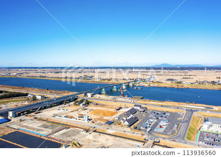 Construction work to make the Ken-O Expressway four-lane and roadside station Hakko no Sato Kozaki (Kanzaki Town, Chiba Prefecture) *Mt. Tsukuba in the distance 113936560