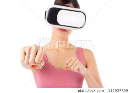 Young asian woman in sportswear wearing vr headset for exercise with punch isolated. 113937799