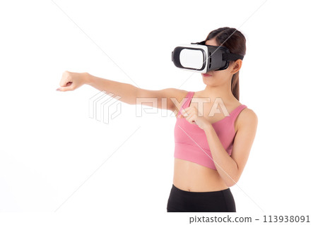 Young asian woman in sportswear wearing vr headset for exercise with punch isolated. 113938091