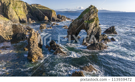 Aerial view of the Crohy Head Sea Arch, County Donegal - Ireland. 113939472