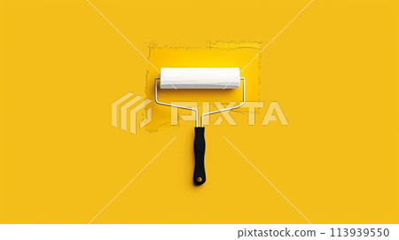 Paint Roller on Yellow Wall With Black Handle 113939550