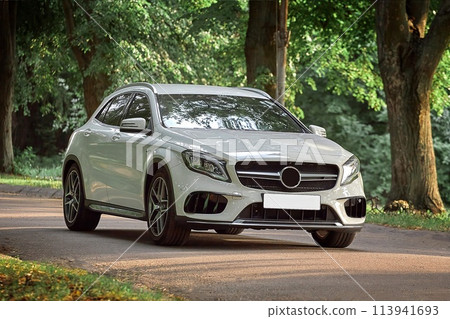 Modern white car driving in the country side background,  luxury city car wallpaper 113941693