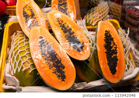 Fresh fruits on shelf in market. Healthy and food concept. Fresh papaya at farmer's market 113942046