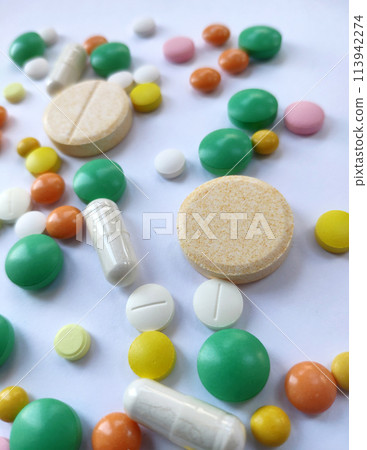 Stack of colourful pills, medicine background 113942274