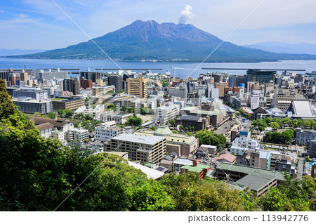 Sakurajima and Kagoshima cityscape seen from Shiroyama Park Observatory Sakurajima and Kagoshima cityscape seen from Shiroyama Park Observatory 113942776