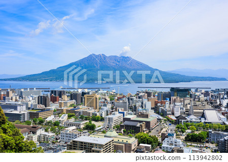 Sakurajima and Kagoshima cityscape seen from Shiroyama Park Observatory Sakurajima and Kagoshima cityscape seen from Shiroyama Park Observatory 113942802