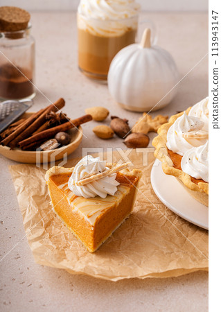 Pumpkin pie with cheesecake swirl for Thanksgiving 113943147