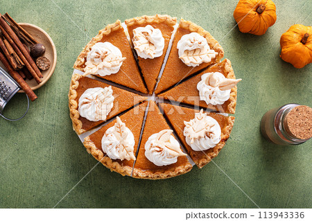 Traditional pumpkin pie for Thanksgiving with whipped cream Traditional pumpkin pie for Thanksgiving with whipped cream 113943336