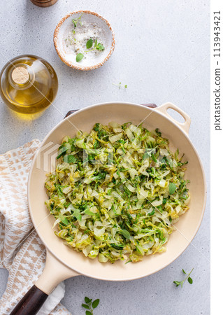 Sauteed cabbage in a cast iron pan, side dish idea Sauteed cabbage in a cast iron pan, side dish idea 113943421