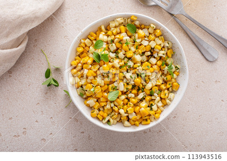 Sauteed yellow and white corn with herbs, healthy side dish idea Sauteed yellow and white corn with herbs, healthy side dish idea 113943516