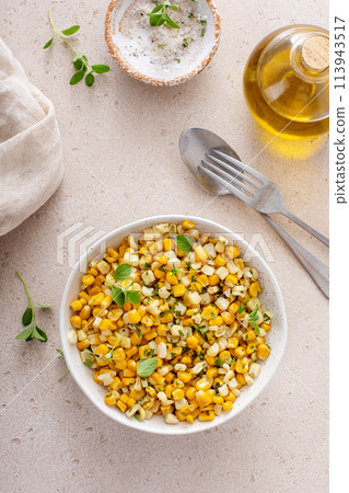 Sauteed yellow and white corn with herbs, healthy side dish idea Sauteed yellow and white corn with herbs, healthy side dish idea 113943517