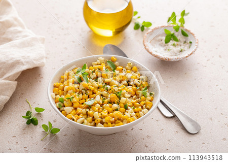 Sauteed yellow and white corn with herbs, healthy side dish idea Sauteed yellow and white corn with herbs, healthy side dish idea 113943518
