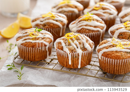 Lemon zucchini muffins with thyme and cream cheese glaze Lemon zucchini muffins with thyme and cream cheese glaze 113943529