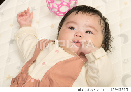 [Baby sucking thumb and toys] 113943865