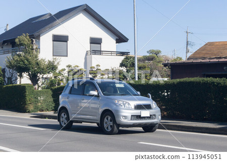Compact car road driving 113945051