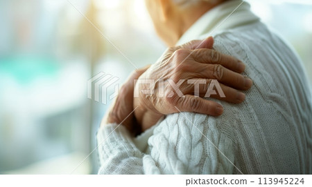 Image of an elderly man concerned about shoulder pain/pain Image of an elderly man concerned about shoulder pain/pain 113945224