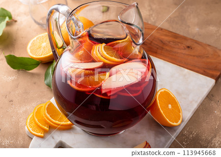 Refreshing summer berry sangria with apples, oranges and blueberry Refreshing summer berry sangria with apples, oranges and blueberry 113945668