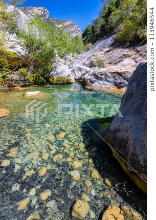 Landscape of green mountains in Sadernes, Catalonia, Spain 113946544