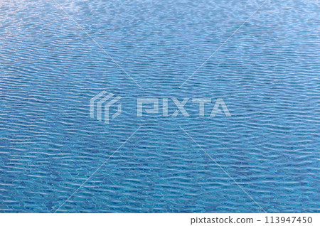 Blue water. Background. Rest in the pool. Pure water. Waves. Blue background.1 Blue water. Background. Rest in the pool. Pure water. Waves. Blue background.1 113947450