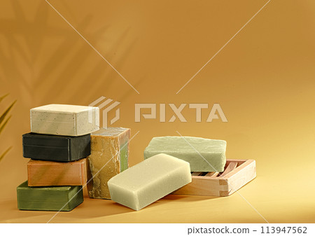 Handmade Soaps on yellow background. Handmade Soaps on yellow background. 113947562