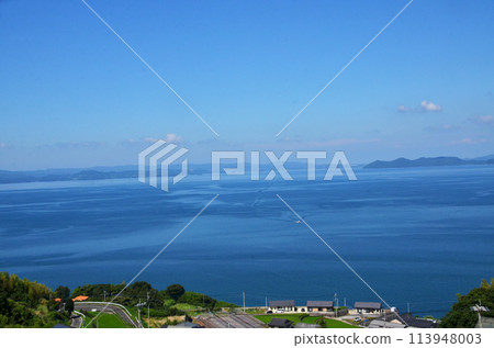 Lush bay scenery, countryside surrounded by blue sea, a spectacular spot where the mountains meet the sea Lush bay scenery, countryside surrounded by blue sea, a spectacular spot where the mountains meet the sea 113948003