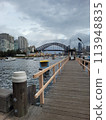 Sydney's harbour foreshore set against the famous Sydney Harbour bridge on a cloudy overcast day Sydney's harbour foreshore set against the famous Sydney Harbour bridge on a cloudy overcast day 113948835