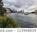 Sydney's harbour foreshore set against the famous Sydney Harbour bridge on a cloudy overcast day Sydney's harbour foreshore set against the famous Sydney Harbour bridge on a cloudy overcast day 113948839