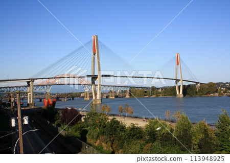 Patulo Bridge over the Fraiser River in New Westminsterr, British Columbia, Canada 113948925