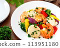 Stir-fried scallops, shrimp and green vegetables 113951180