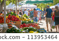 A bustling farmer's market with fresh produce and artisanal goods 113953464