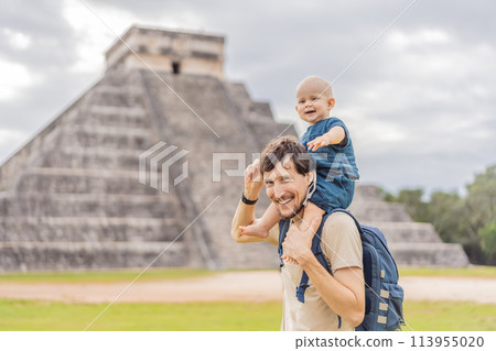 Father and son tourists observing the old pyramid and temple of the castle of the Mayan architecture known as Chichen Itza these are the ruins of this ancient pre-columbian civilization and part of 113955020