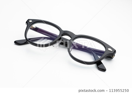 Black-rimmed glasses on a white background 113955250