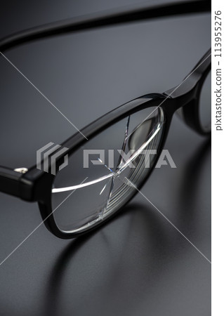 Broken glasses lenses 113955276