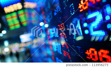 A collection of colorful stock exchange ticker symbols displayed on a computer screen 113956273