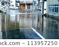 Flooded road intersection due to heavy rain and typhoon 113957250