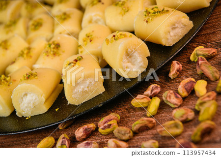 LEBANESE PASTRY RECIPE, ORIENTAL FOOD, HALAWET AL JEBEN, MOZARELLA, ASHTA AND FINE SEMOLINA 113957434