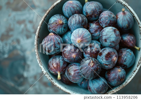 Juicy fig berries in a bowl. 113958206