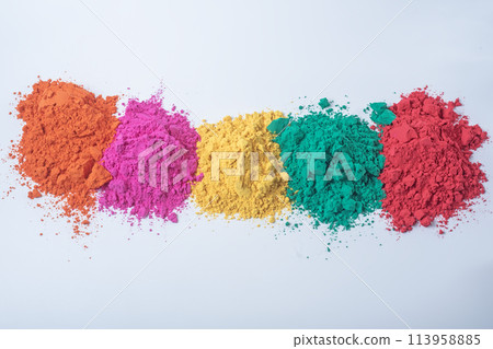 Pile of multicolored holi powder isolated on white background. 113958885