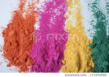 Multicolored holi powder isolated on white background. Indian festival Holi. Multicolored holi powder isolated on white background. Indian festival Holi. 113958899
