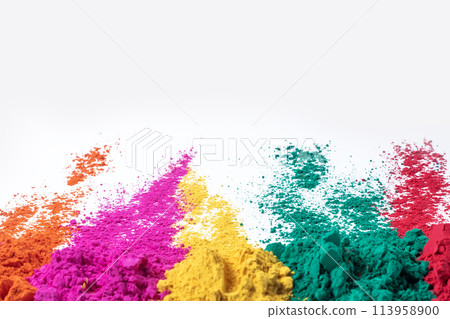 Multicolored holi powder isolated on white background. Multicolored holi powder isolated on white background. 113958900